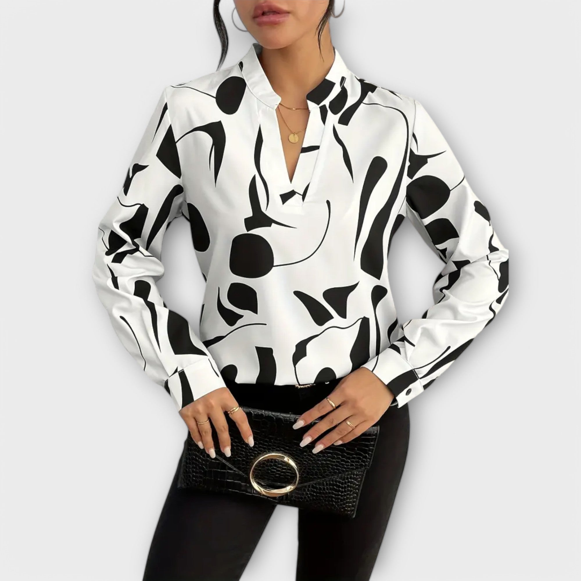 Blusa elegante de manga larga y escote en V