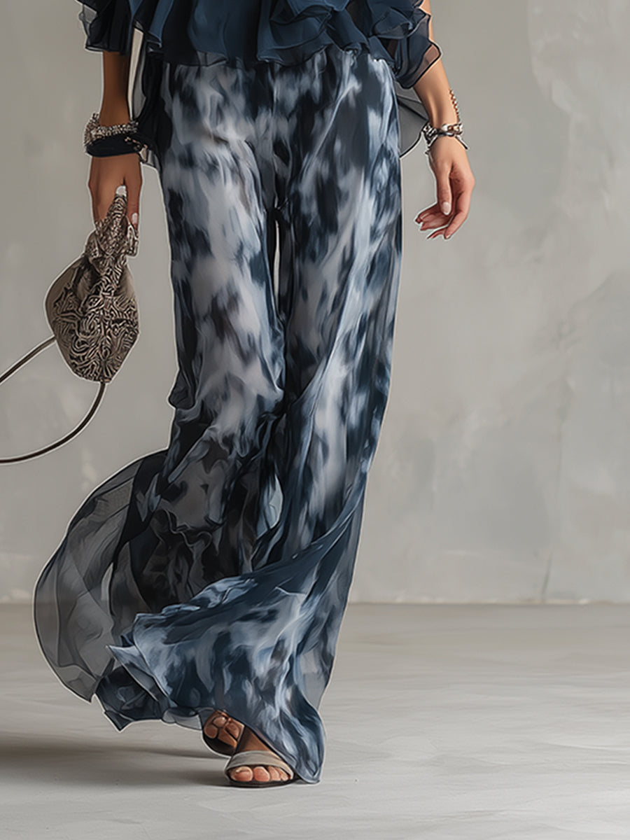 Ensemble élégant aérien avec top fluide et pantalon ample